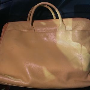 Lodi’s yellow leather bag